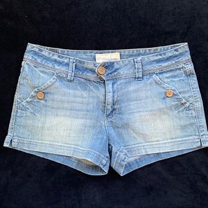 Maurices distressed denim shorts with wood buttons